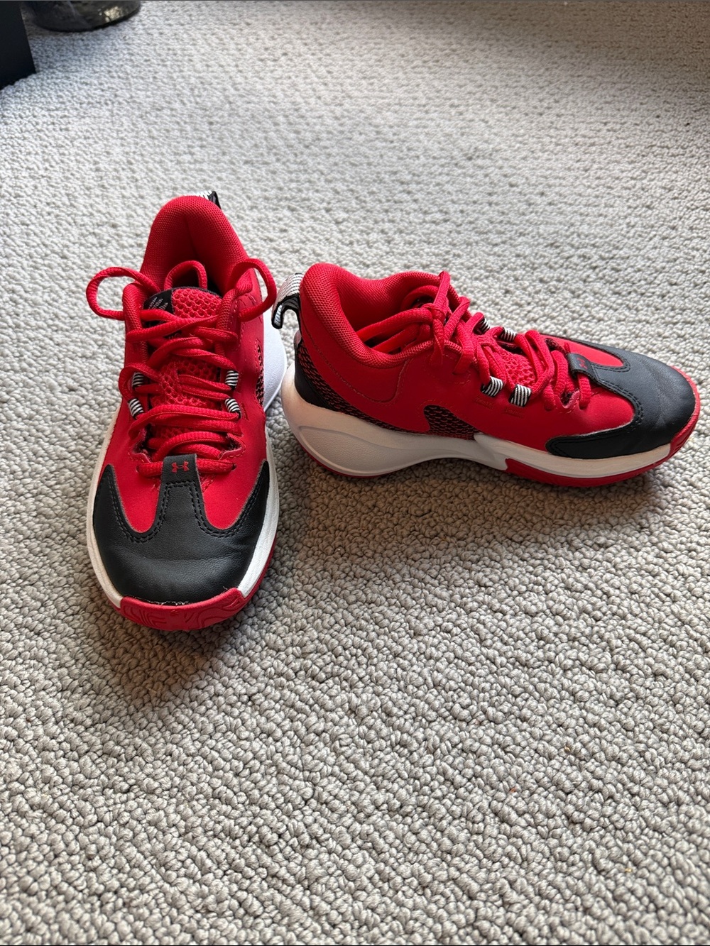Under Armour Steph Curry Kids Red and Black Basketball-Style Sneakers